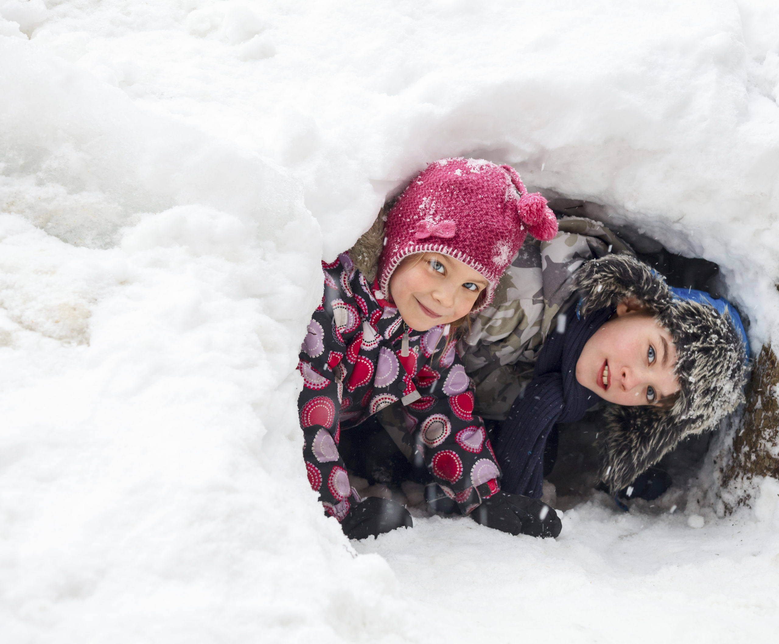 kids following tracks in snow
